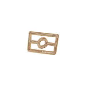 Gold-colored metal ring with a rectangular design on a white background