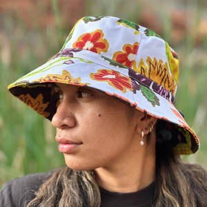 Juluwarlu Group Reversible Bucket Hat - Mrs Read (Native Flowers and Fruits)