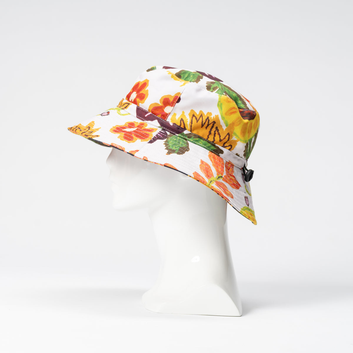 Juluwarlu Group Reversible Bucket Hat - Mrs Read (Native Flowers and Fruits)