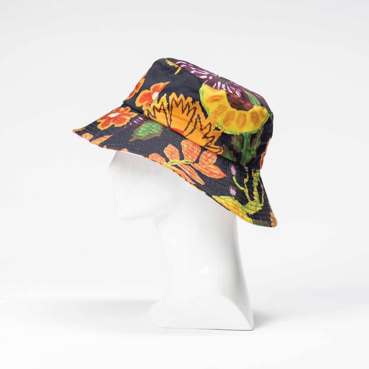 Juluwarlu Group Reversible Bucket Hat - Mrs Read (Native Flowers and Fruits)