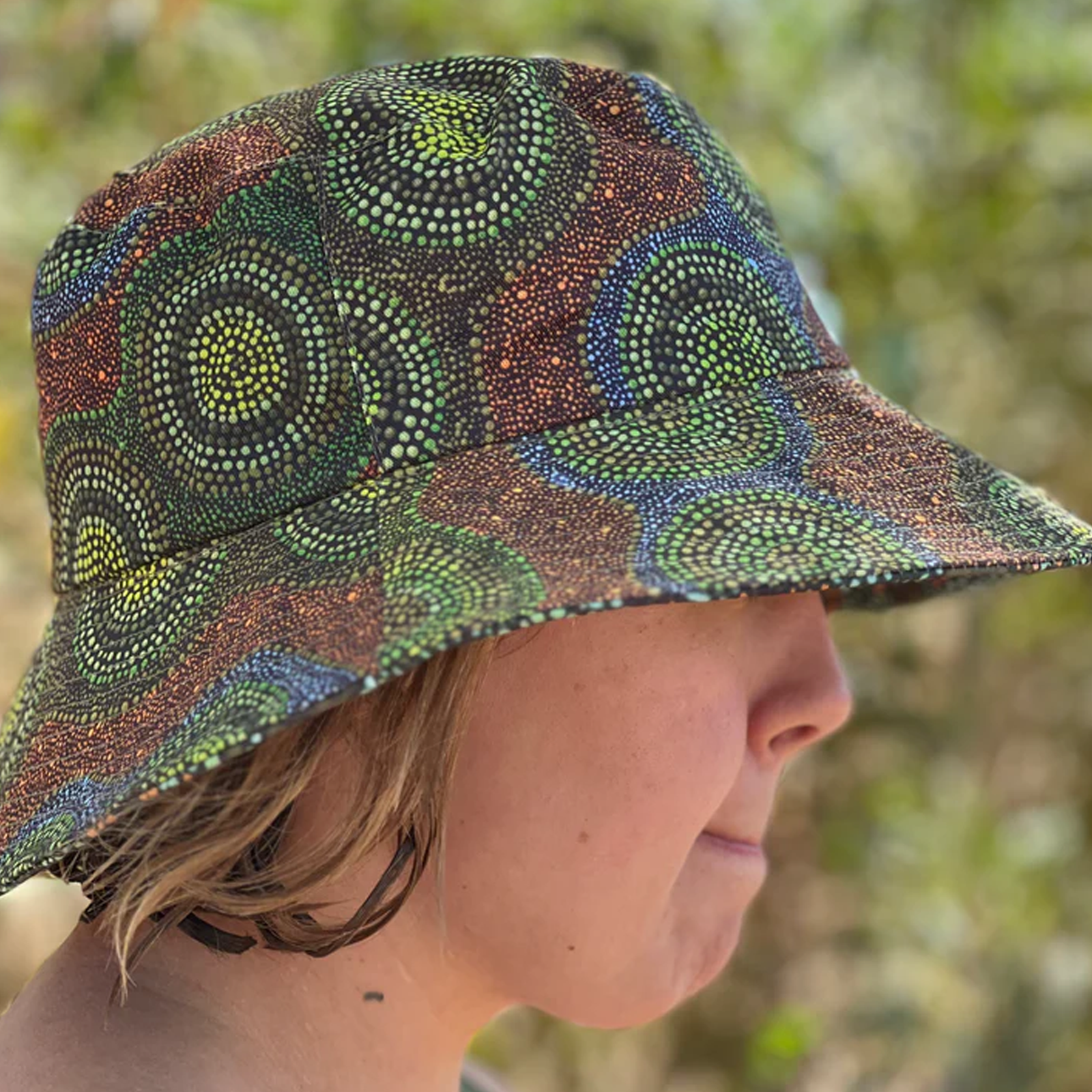 Juluwarlu Group Reversible Bucket Hat - Waterholes and Wildflowers (Joylene Warrie)